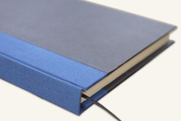 Schreib - und Notizbuch schwarz, mit blauem Leinen